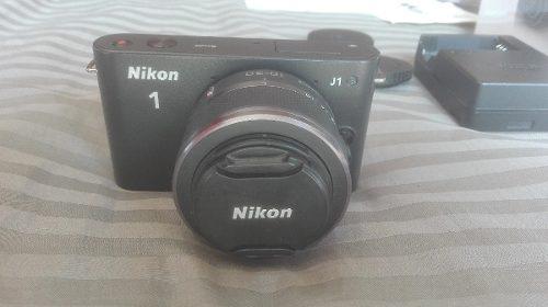 Camara Nikon J1