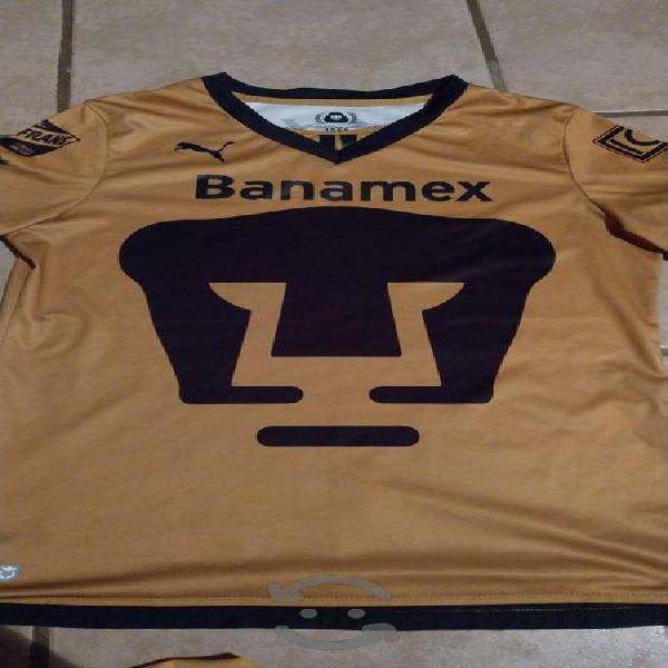 playera pumas dorada