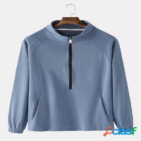 Sudadera suelta con cuello alto y media cremallera de