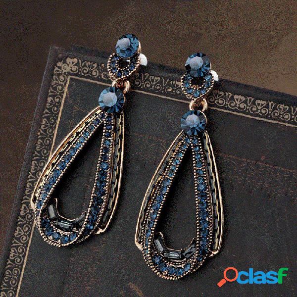 Pendientes vintage lujosos con cristales azules