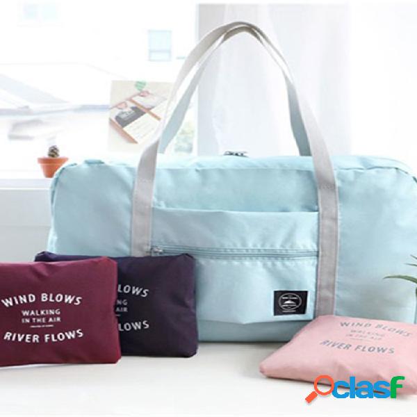 Bolso tote impermeable plegable de gran capacidad en viaje