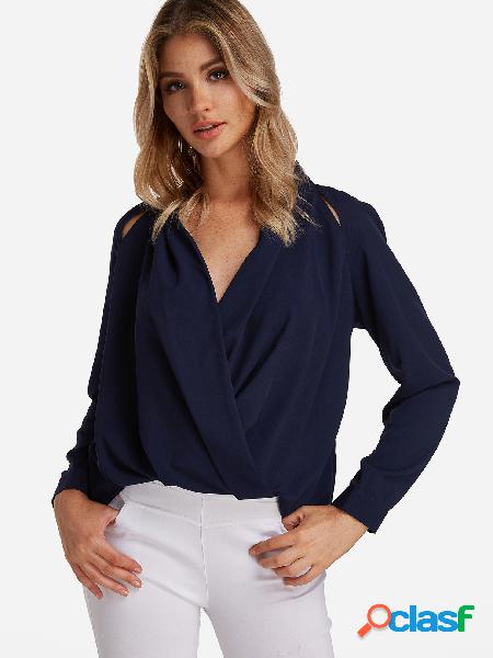 Blusa de manga larga con diseño cruzado en azul marino con