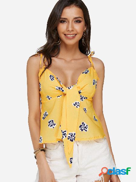 Camisa con cuello en V de color amarillo y estampado floral