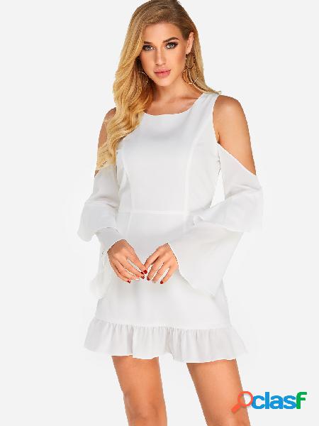 Mini vestido blanco con espalda abierta y mangas largas de