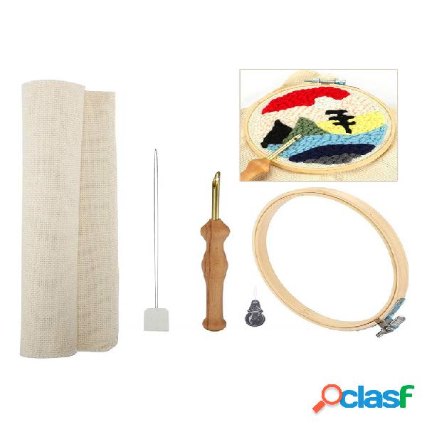 Un juego de madera Magia Bordado Pluma Juego de enhebrador