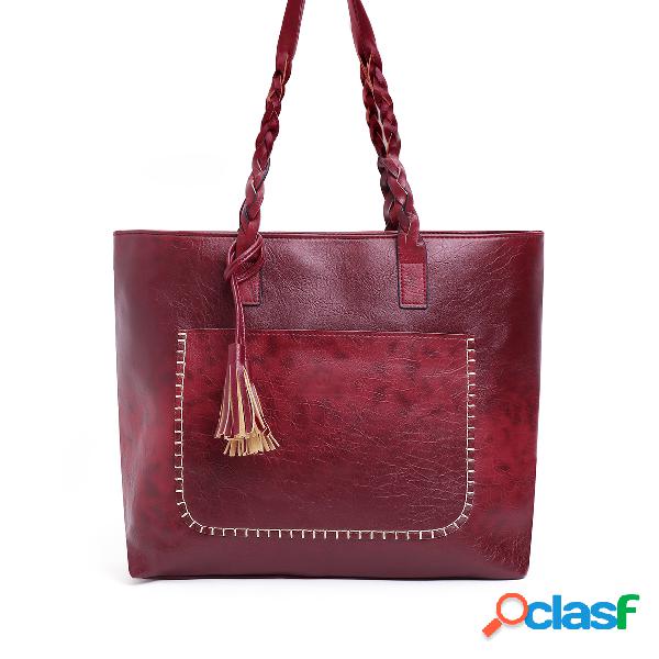 Bolso de hombro con detalle de borla de diseño bordado de