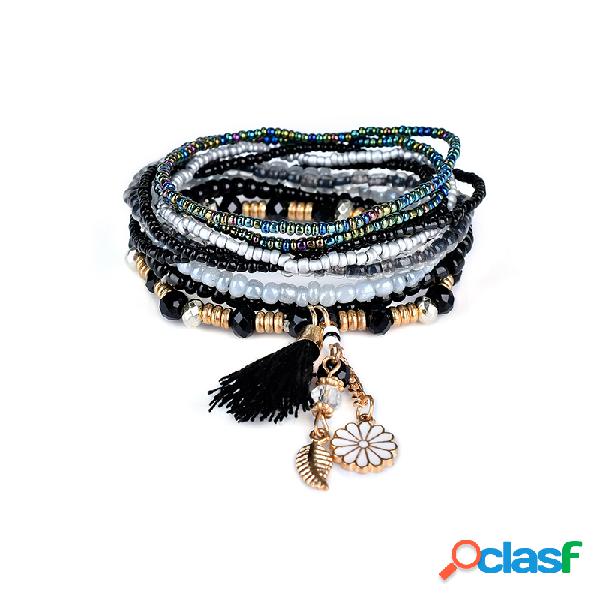 Pulsera bohemia con borla y pendientes de flor y hoja para