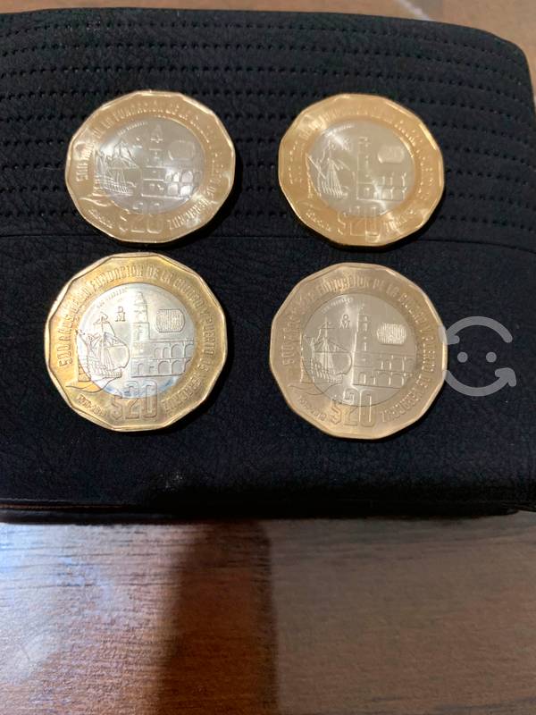 Remate de 4 monedas conmemorativas