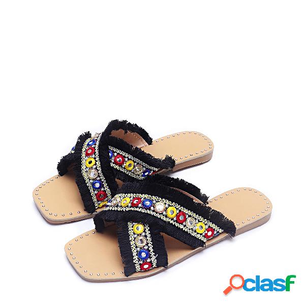 Zapatillas de diseño con borlas negras de Tassel