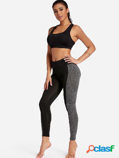Polainas deportivas de color negro y gris de medio cintura